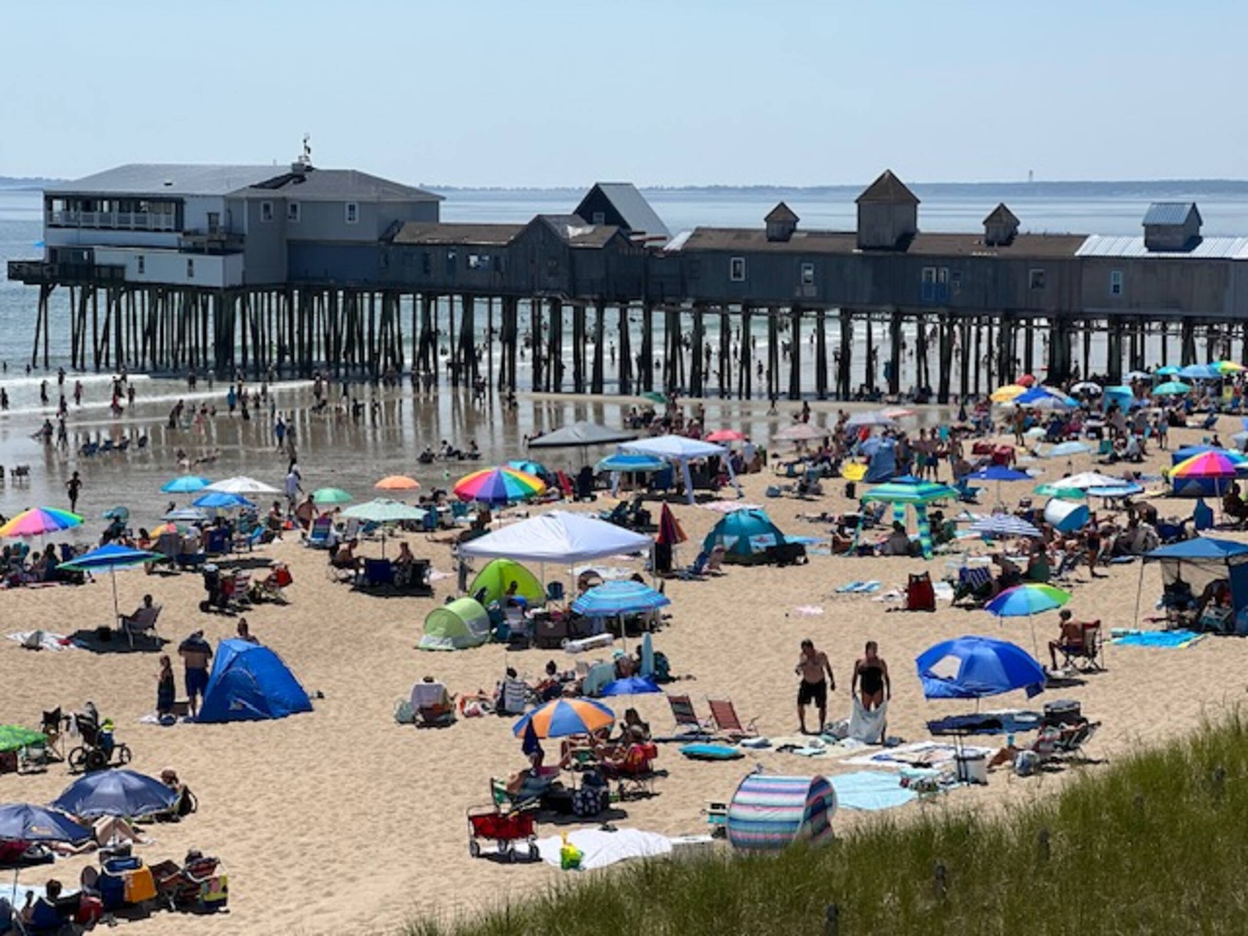 Crowded Old Orchard Beach with the pier in view