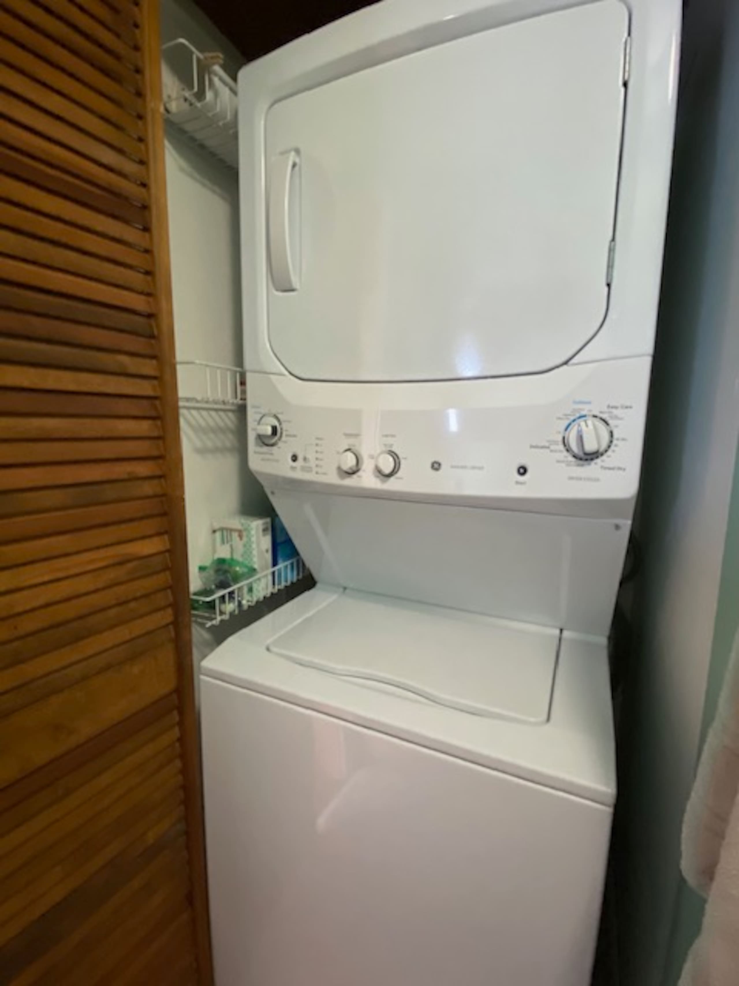 In-unit stacked washer and dryer